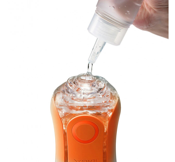 Мастурбатор Tenga Flip Orb — Sunset Orange, з можливістю зміни тиску та стимулювальними кульками всередині