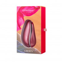 Вакуумный клиторальный стимулятор Womanizer Liberty Pink, магнитная крышка, 2 насадки — Просмотреть изображение 7