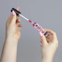 Блиск для губ з ефектом вібрації Secret Play Vibrant Kiss Pleasure For Two Lip Gloss Sweet Popcorn, — Просмотреть изображение 3
