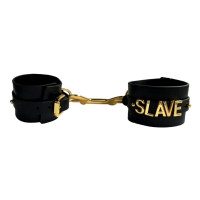 Наручники з написом Slave від UPKO з італійської шкіри, чорні із золотою фурнітурою
